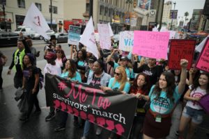 Supporters participating in the 2017 protest march for survivors of sexual assault in Hollywood, Los Angeles. Image: Lucy Nicholson