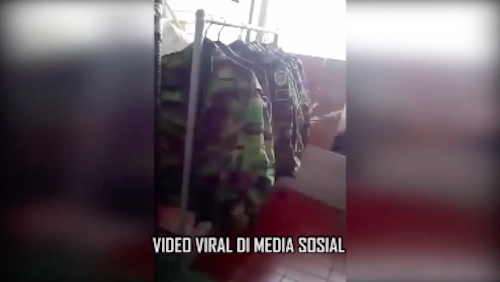 Military uniform supposedly belonging to the Chinese army supposedly hanged at a laundry in North Jakarta. Police have debunked the claims. Photo: screengrab from Instagram/@polres_metro_jakarta_utara
