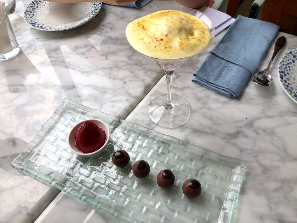 Crema Catalana (top) and Liquid Chocolate Bonbons with blackcurrant sorbet. Mare Nostrum has slimmed down its menu to only include dishes that can be served in accordance with COVID-19 protocols ⁠— which sadly excludes the Liquid Chocolate Bonbons. 