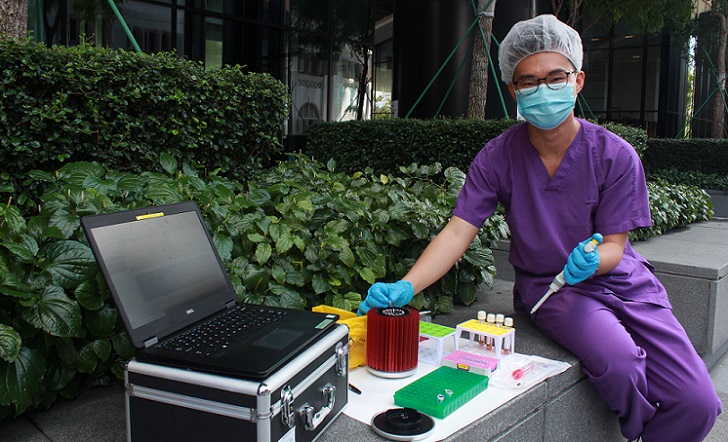 A man with the portable test expected to be deployed in community healthcare settings soon. Photo: NTU
