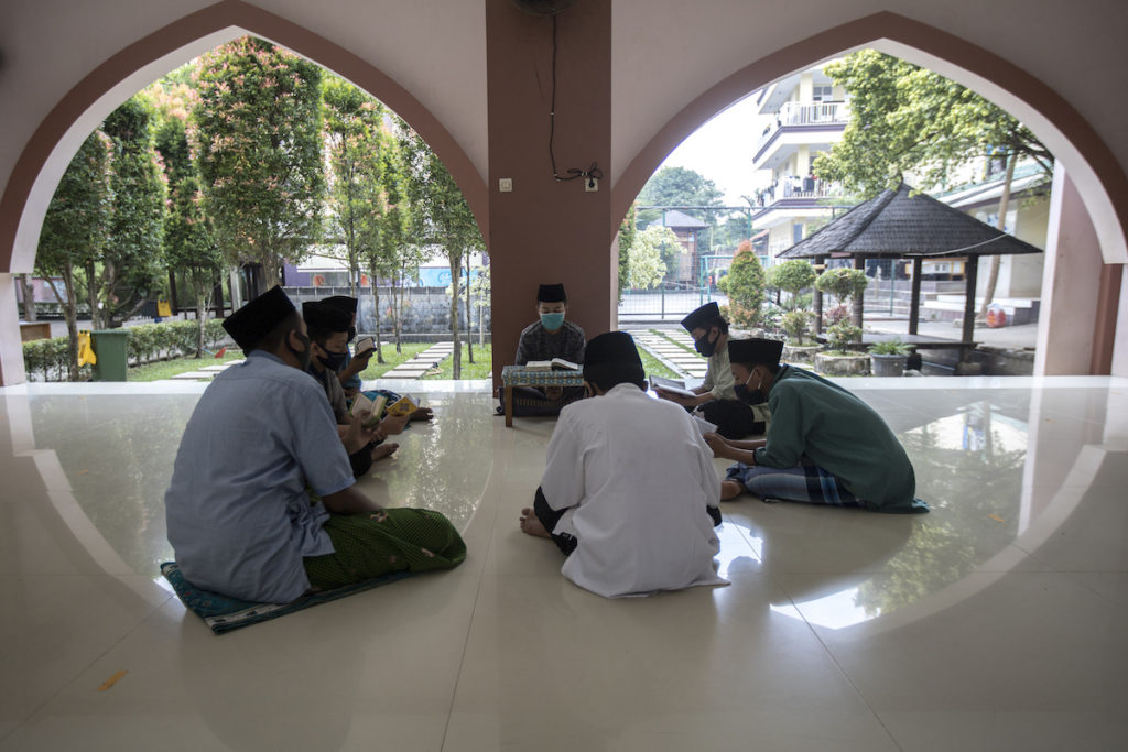 Reading, reciting, and dissecting the meaning of the Quran are a major part the daily lives of An Nuqthah's students. Photo: Coconuts Media/Agung