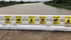 Posters of missing activists on a bridge at the Lam Thuan Reservoir today. Photo: Supachai Chansiri / Courtesy