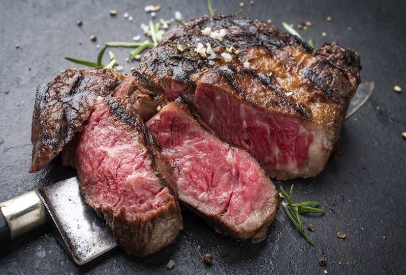 Wagyu beef steak above a knife. Photo: Heinz Leitner
