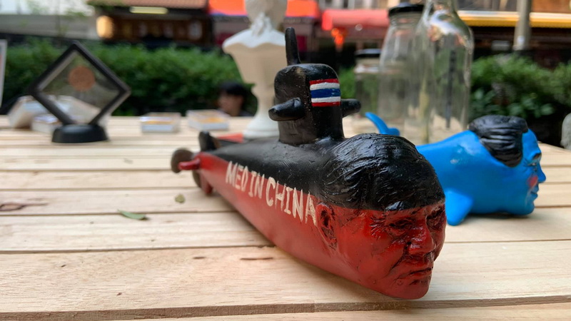PM Prayuth Chan-o-cha is the figurehead on a submarine sculpture at the current ‘Unmuted Project’ art exhibition in Soi Thonglor 3. Photo: Coconuts