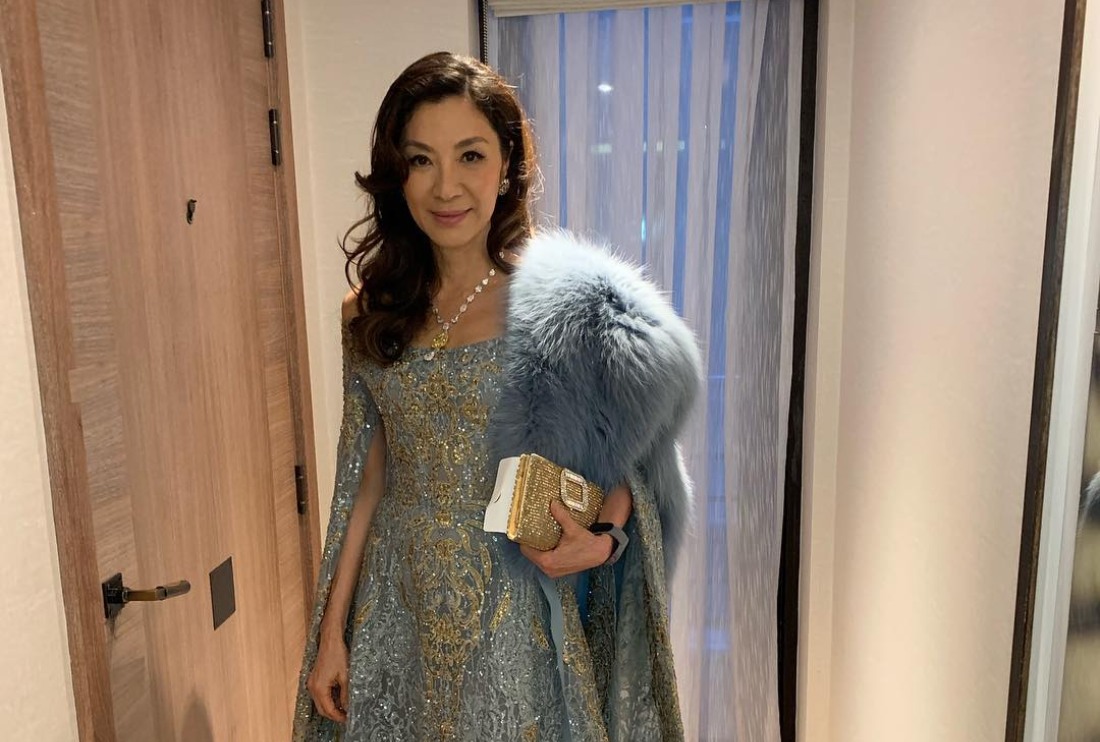 Michelle Yeoh pictured in a hotel room, wearing a dress by Elie Saab. Photo: Michelle Yeoh /Instagram
