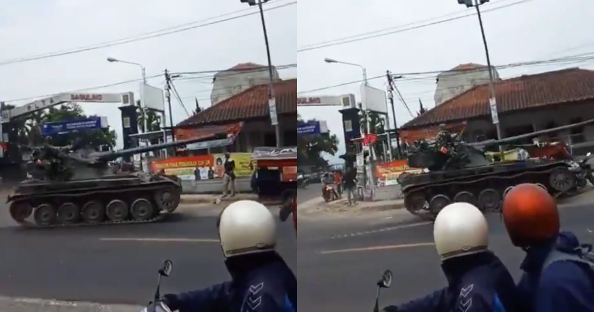 A tank belonging to an Indonesian Army unit in West Bandung regency, West Java appeared to lose control and accelerated before crashing into a gorengan cart and several motorcycles parked on the roadside. Screenshot from the video