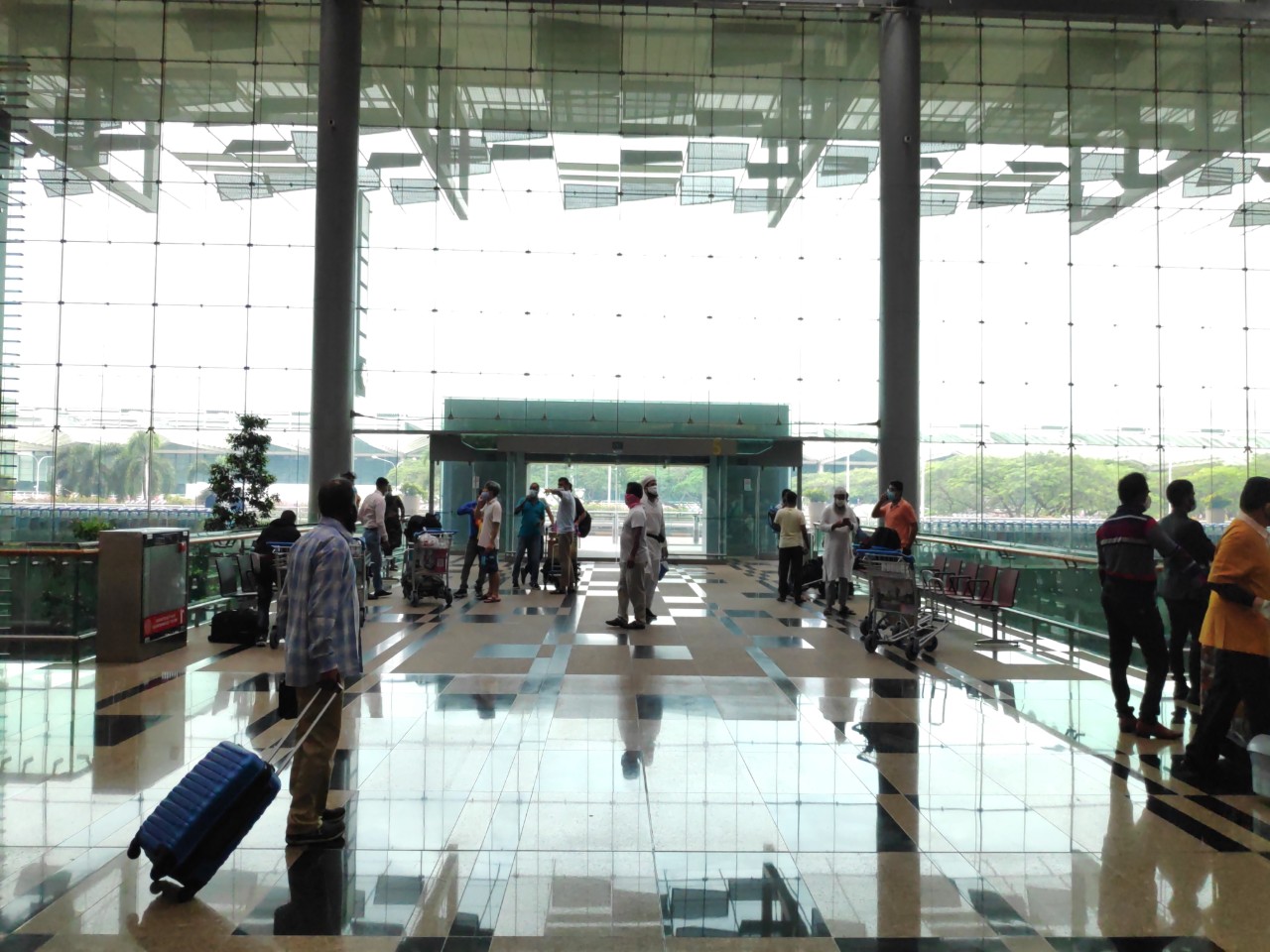 Travelers move through Singapore’s Changi Airport Terminal 3 on Aug. 25, 2020. Photo: Natasha Zaman