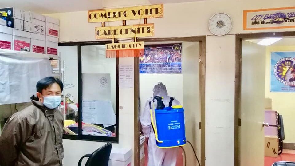 A healthcare worker sanitizes the office of the Commission on Elections in Baguio City. Photo: COMELEC/FB