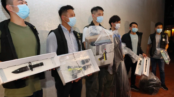 Police confiscated the weapons at the mother and son’s Fanling home on Sept. 24, 2020. Photo via Apple Daily