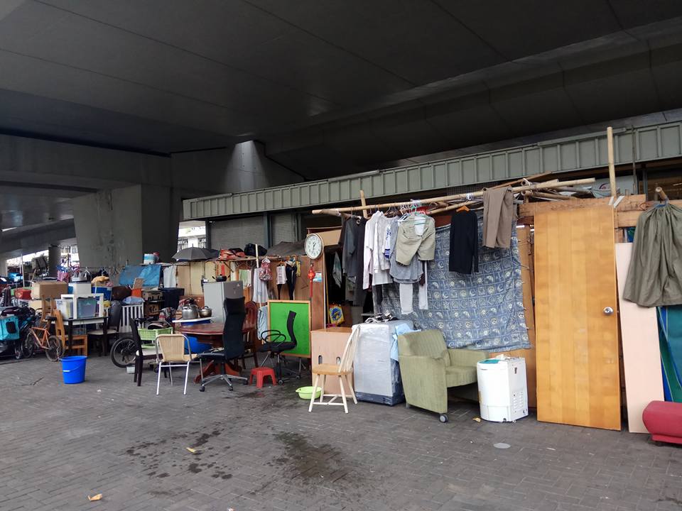 2016 picture shows makeshift houses beneath an underpass outside the market. Photo via Facebook/Chris Yun