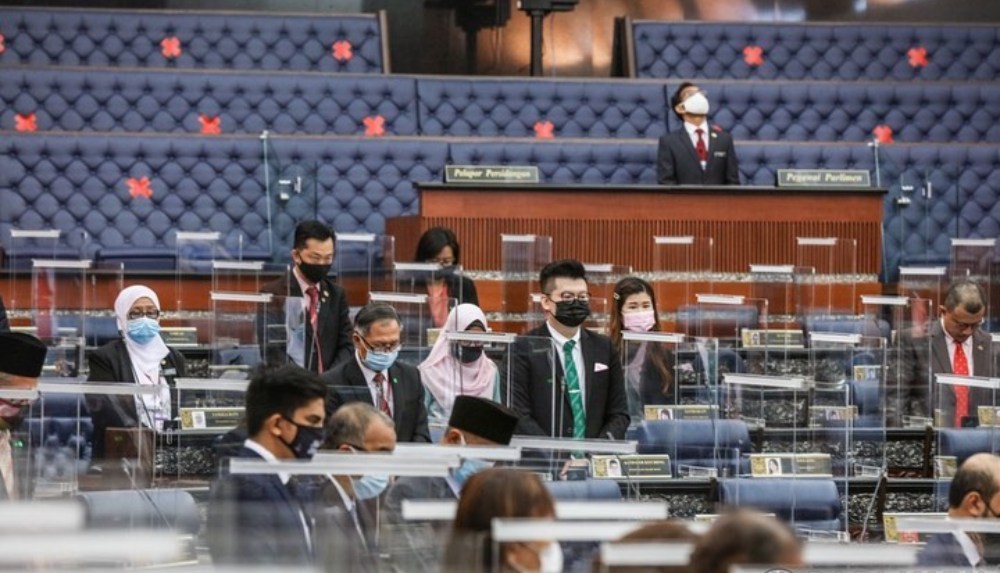 Parliament representatives standing at the House of Parliament today. Photo: Parlimen Malaysia/Facebook
