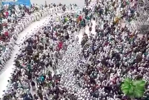 Thousands welcome home FPI leader Rizieq Shihab at the Soekarno-Hatta International Airport on Nov. 10, 2020 after the firebrand cleric’s more than three years of self-imposed exile in Saudi Arabia. Photo: Video screengrab from Twitter/@DPPFPI_ID