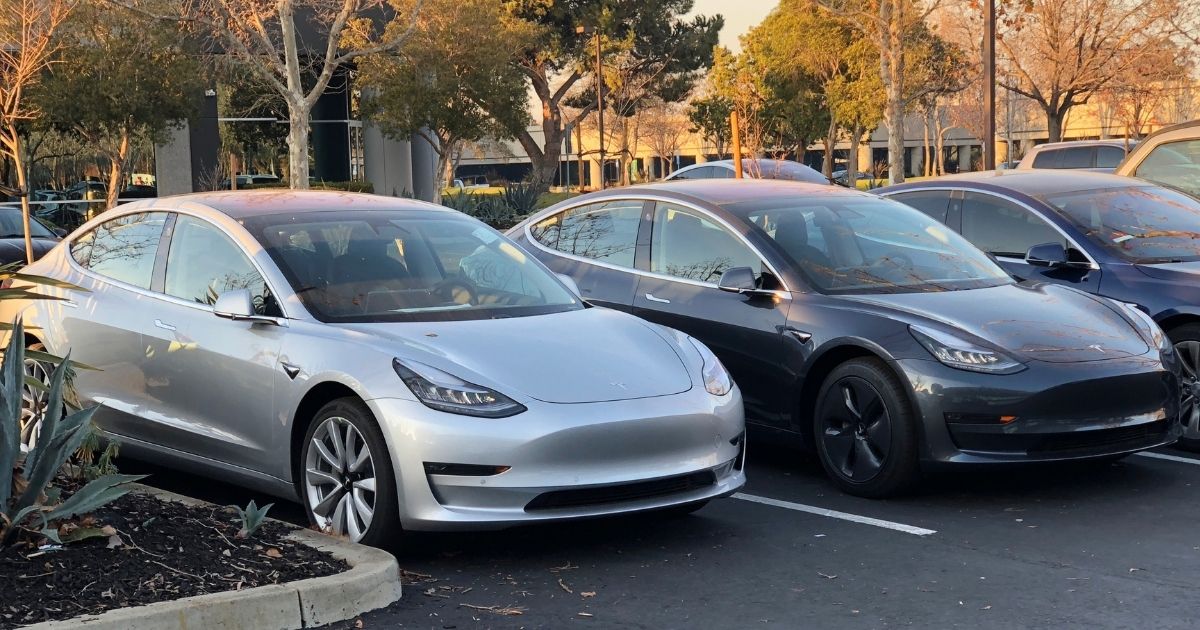 Tesla Model 3 electric cars in Silver and Midnight Silver. Photo: Seungho Yang/Wikimedia Commons