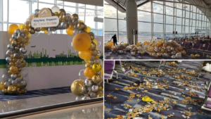 Balloons celebrating the launch of the Hong Kong—Singapore travel bubble were promptly taken down and burst at the Hong Kong International airport. Photo via Facebook/傑出關公災難
