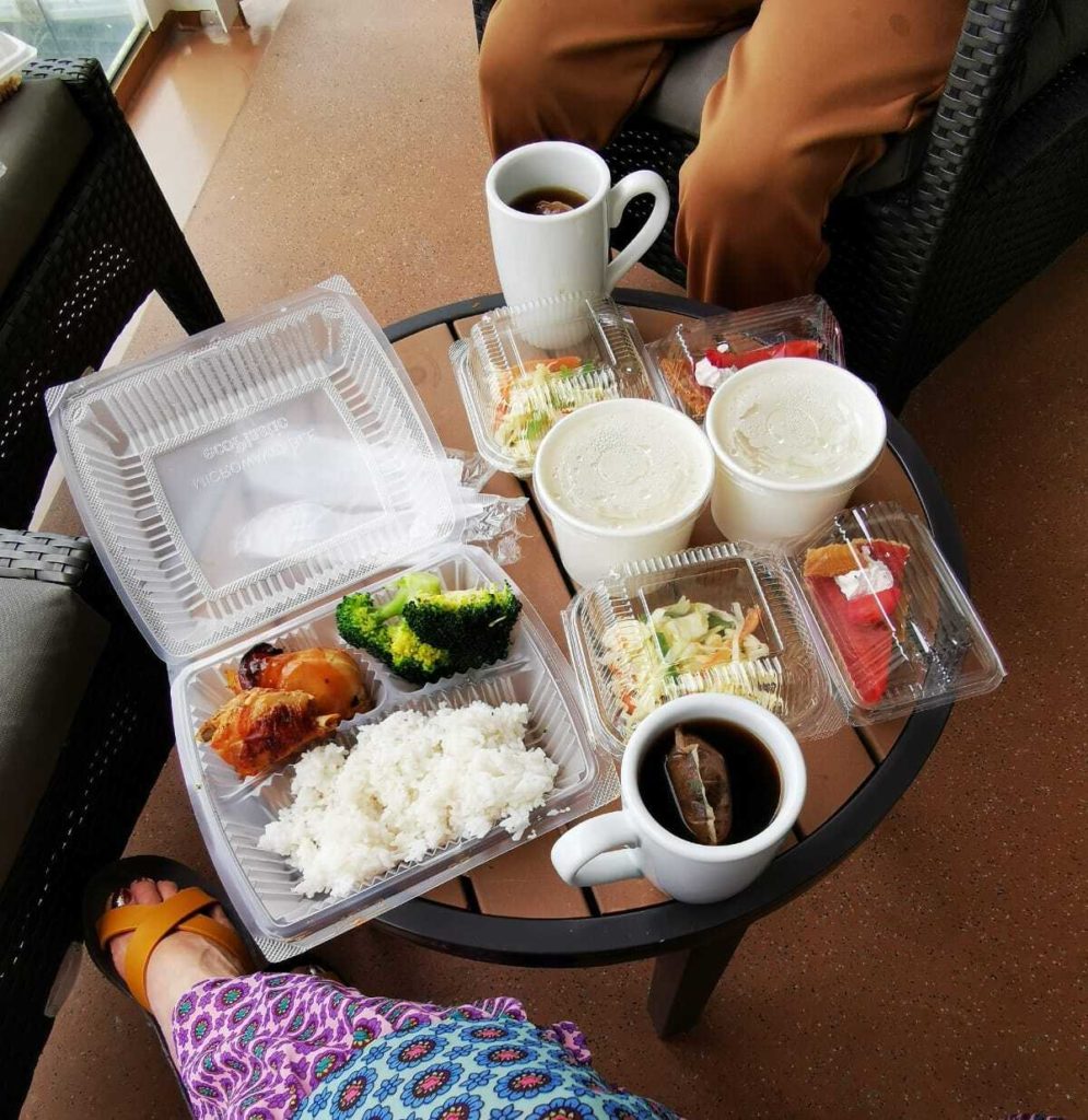 Bento box lunch with a side of salad and a slice of cake served to guests onboard. Photo: Michelle Lee 