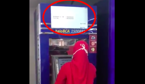 An overhead screen mirroring ATM transaction screen below. Photo: Twitter