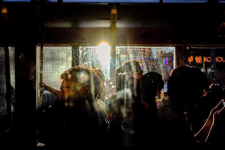 One of Kaye's photos on her private Instagram account, where she shares her photography, is a carefully composed shot of bus commuters stuck in traffic.