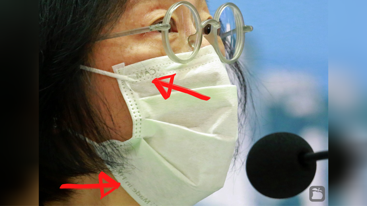 Health Secretary Sophia Chan’s mask was reversed as she led a press conference about tightening COVID-19 restrictions on Dec. 8, 2020. Photo via Apple Daily
