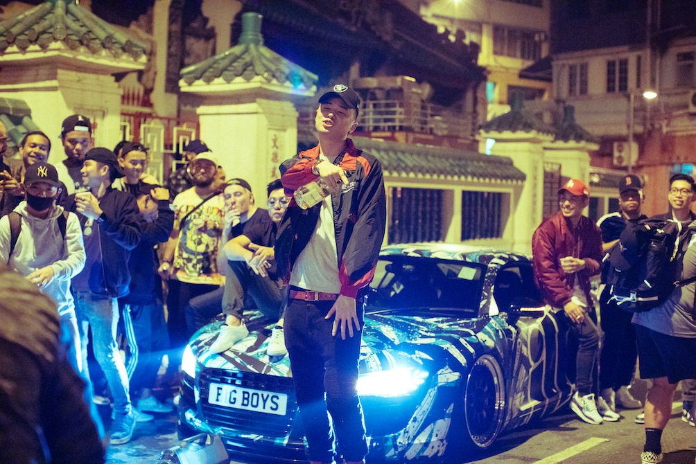 Tomiyama and his friends shoot a music video for 'Hollywood Road' outside Man Mo Temple in Sheung Wan. Photo: Alex Maeland/ MAEKAN