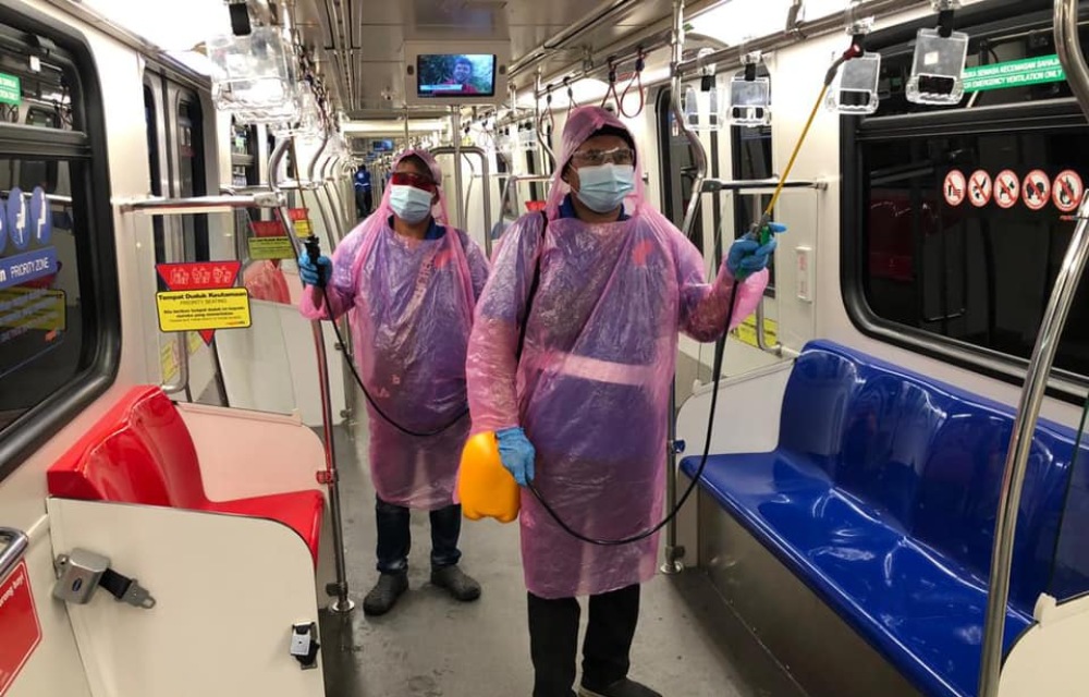 Rapid KL staff disinfect a train in an October photo. Photo: Rapid KL/Facebook
