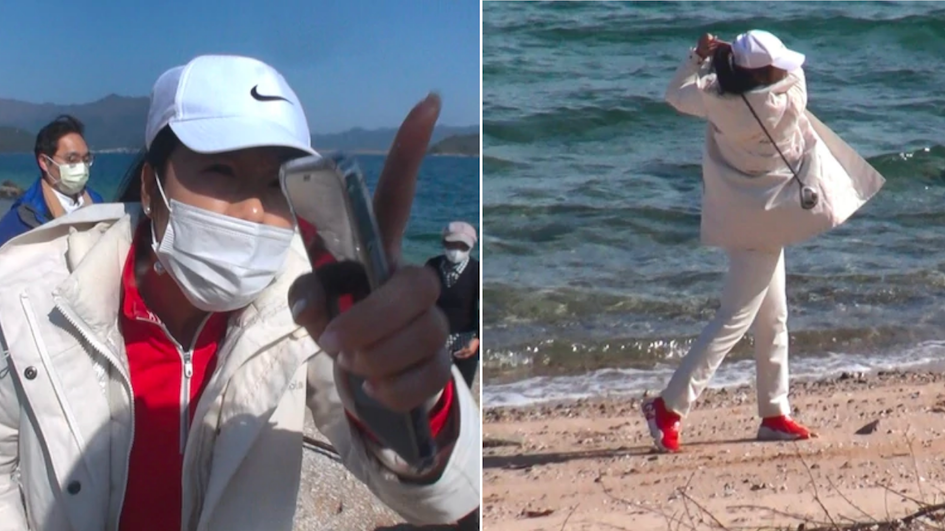 A woman caught playing golf at a beach in Ma On Shan yelled at reporters who approached her and threatened to break their cameras. Photos via Apple Daily