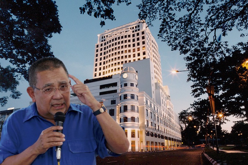 Edited photo of Isa Samad against the Merdeka Palace Hotel & Suites in Kuching, Sarawak. Photo: Coconuts
