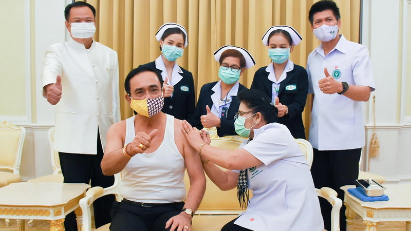 PM Prayuth Chan-o-cha gets a flu job last year at the Government House. Photo: Government House