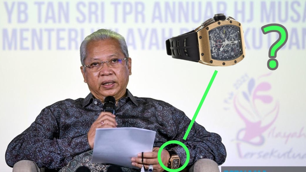 Annuar Musa at an event on Feb. 1, 2021 with an image of a Richard Mille watch. Photo: Coconuts