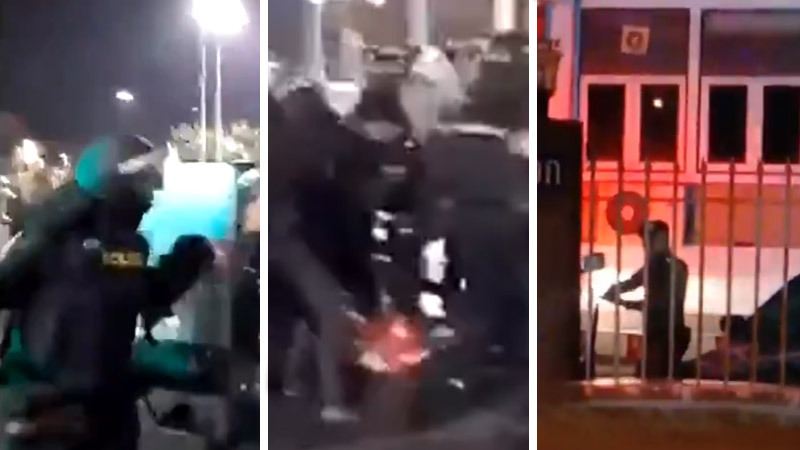Police rush the crowd, beat a medic and aim a handgun at protesters in images from Saturday’s altercations. Images: VolunteerMedTH, Lovepuy42 / Twitter