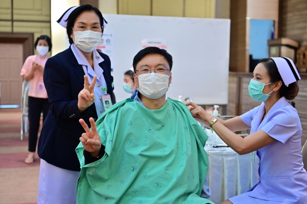 File photo of a Thai health worker being vaccinated this week. Photo: Department of Disease Control / Facebook
