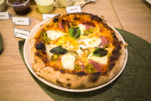 A 10-inch DIY special pizza that has beef salami, jalapeno, egg, basil, mozzarella and parmigiano cheese on a Margherita base. Photo: Coconuts
