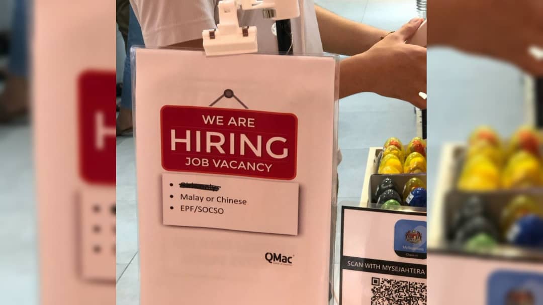 Job ad in front of QMac at Setia City Mall. Photo: Sharman Veraj/Instagram
