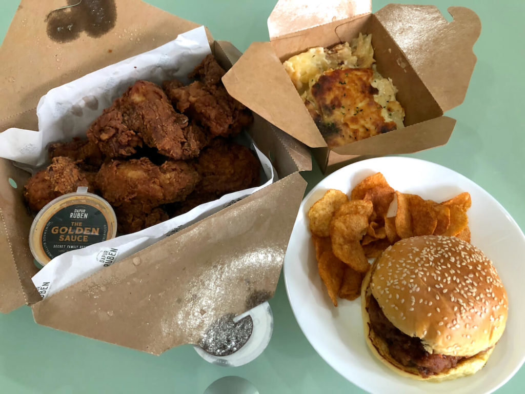 (From left, clockwise) Dapur Ruben’s 6-piece BFC (Buttermilk Fried Chicken) Set with Truffled Potato Gratin, Hand-cut Chips with Cajun Seasoning, and ABC Burger.