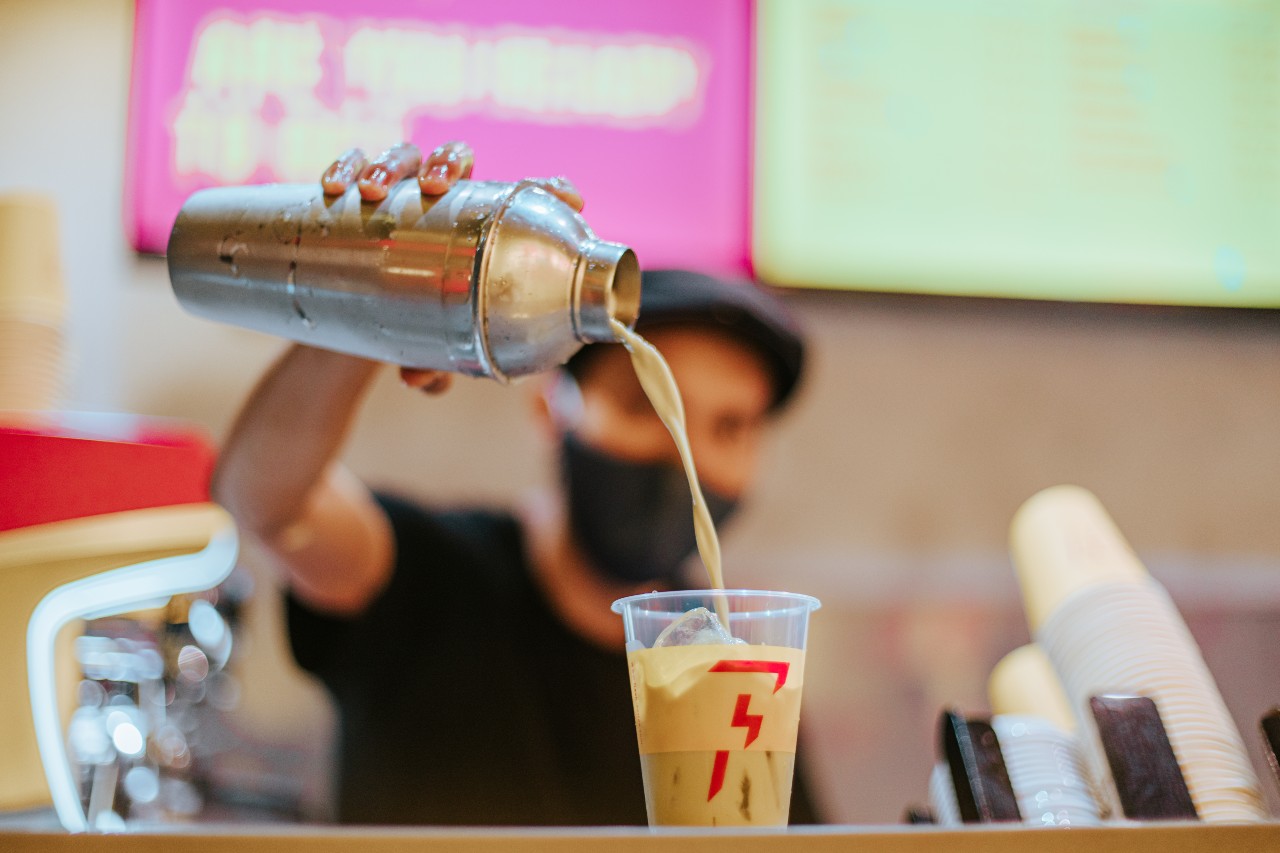 A barista prepares a drink. Photo: Flash Coffee