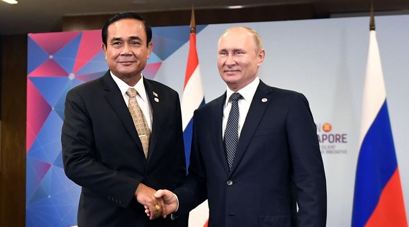 Prime Minister Prayuth Chan-o-cha and Russian President Vladimir Putin at the 2018 ASEAN summit in Singapore