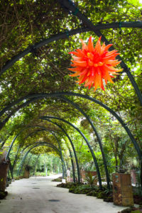 Chihuly Studio’s ‘Orange Hornet Chandelier’ at the World of Plants. Photo: Coconuts