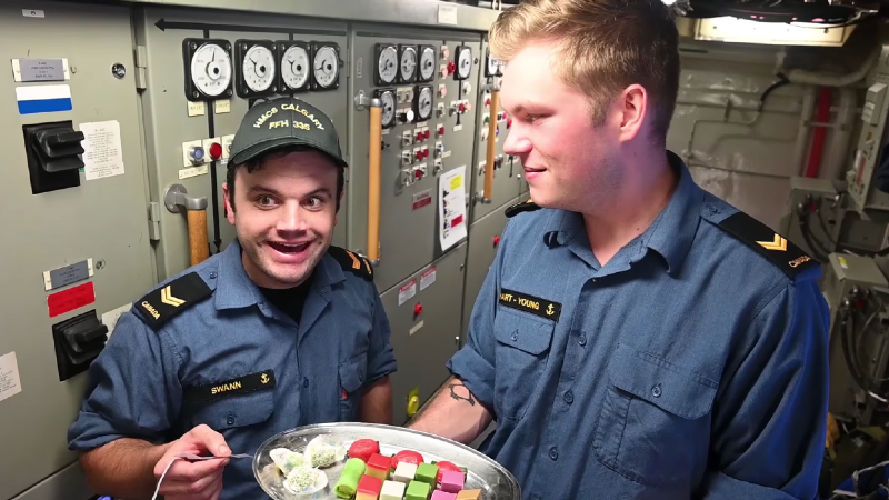 Sailors react to kueh. Photo: HMCS Calgary
