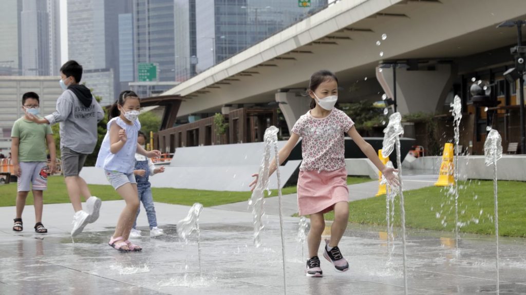 Kids playing the newly opened musical fountain. Photo: Hong Kong government Information Services Dept.