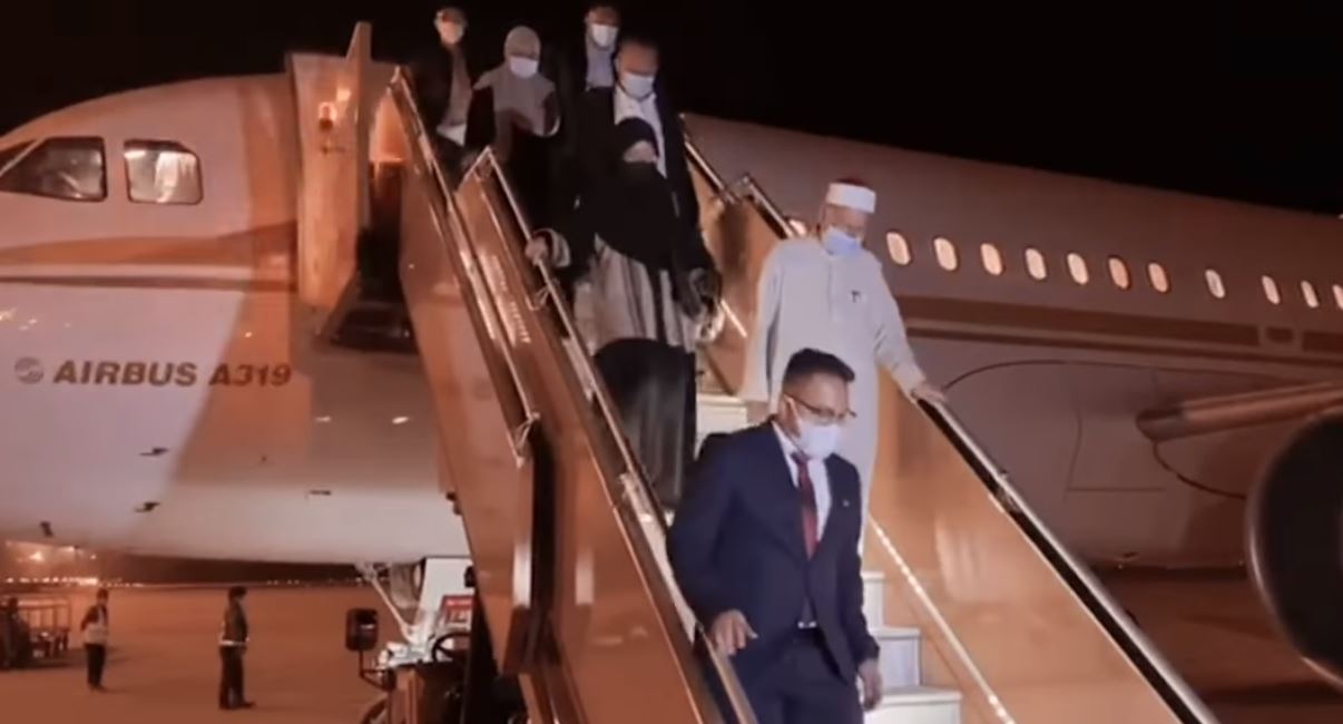 Zulkifli Al-Bakri, in white, and his entourage arriving at Saudi Arabia on April 12, 2021. Photo: Zulkifli Al-Bakri/Facebook