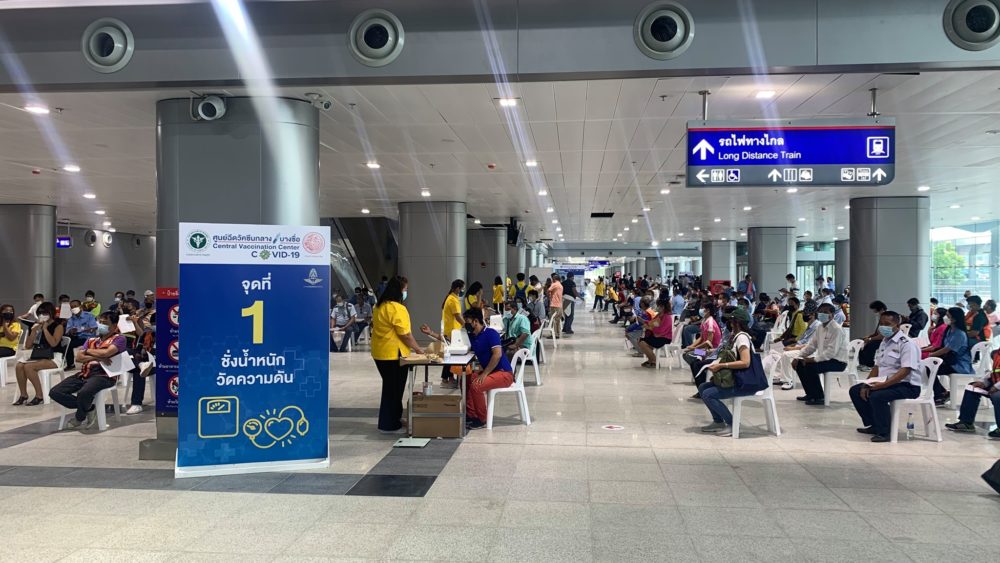 Public transport workers on Monday morning at Bang Sue Grand Station queue for vaccines. Photo: Smart Taxi, Ltd.