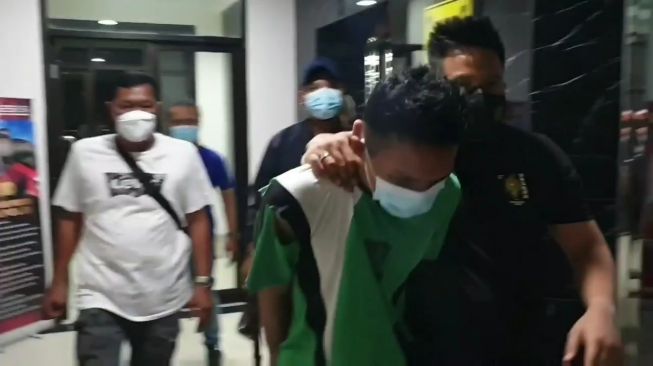 AA in police custody. Photo: Jakarta Metro Police