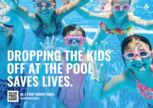 A promotional poster features children swimming. Image: AMILI