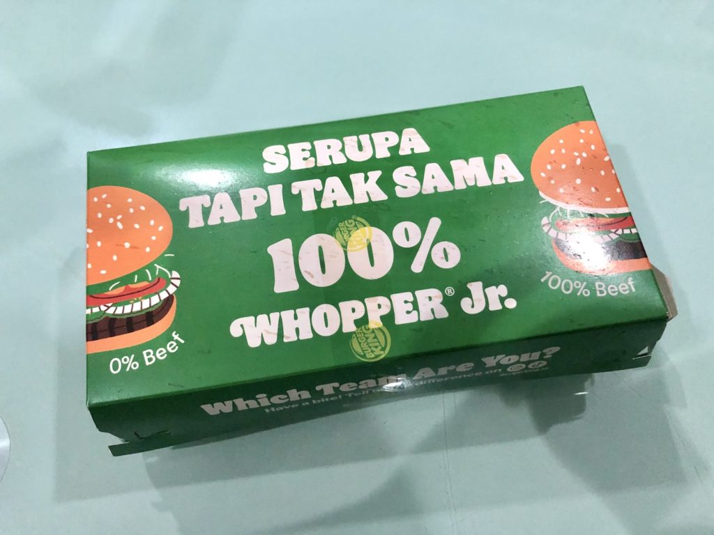 Burger King Indonesia's “Serupa Tapi Tak Sama/Spot The Difference!” package, which consists of a plant-based and a regular Whopper Jr. each. 