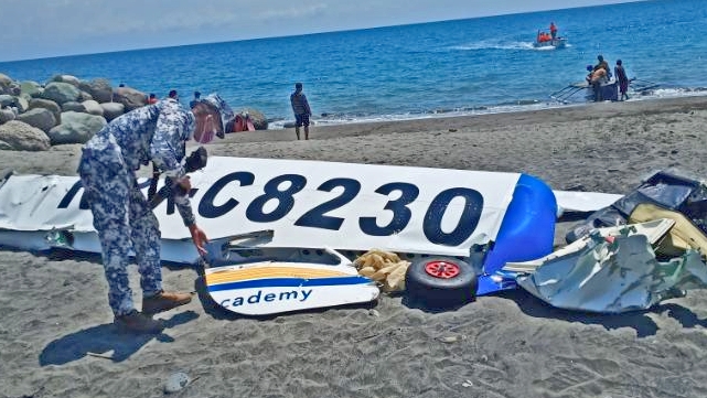 The Philippine Coast Guard recover crashed trainer aircraft in La Union