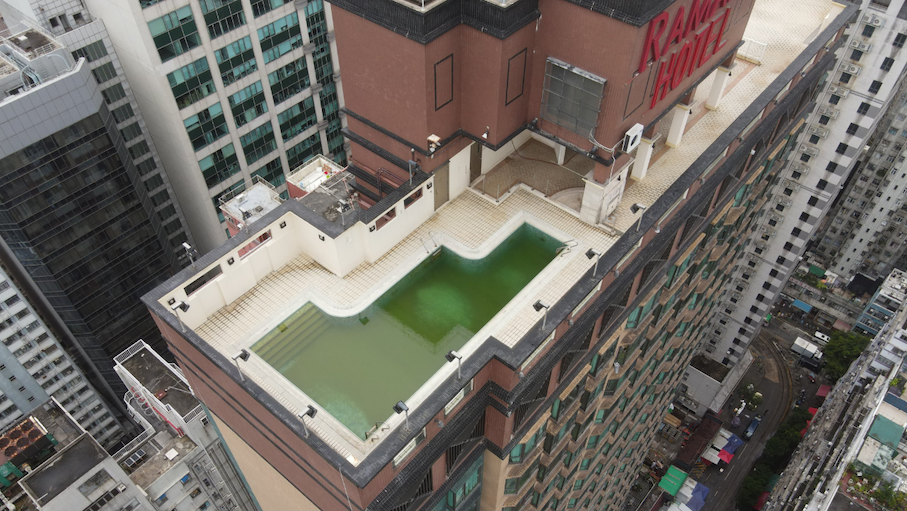 The green, algae-infested pool belongs to Ramada Hong Kong Grand View, a hotel in North Point. Photo: Nathan Brown