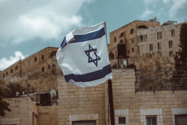 Israel flag. Photo: Taylor Brandon/Unsplash