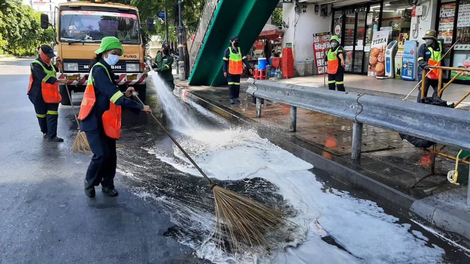 Bangkok staff on June 4 clean the roads in the Silom area. Photo: Bangrak District Office
