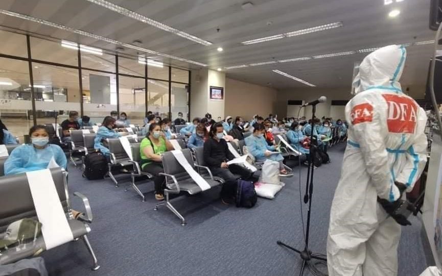 OFWs from Riyadh receive a briefing from the Office of the Undersecretary for Migrant Workers Affairs (DFA-OUMWA)