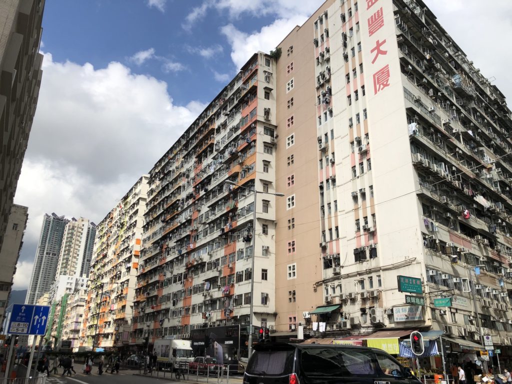 To Kwa Wan is home the mammoth I-Feng Mansions, a dense cluster of four colorful blocks where hourly hotels sit down the hall from subdivided flats, has been the shooting site of Hollywood blockbusters like Contagion and even a 2014 Transformers film. Photo: Coconuts Media