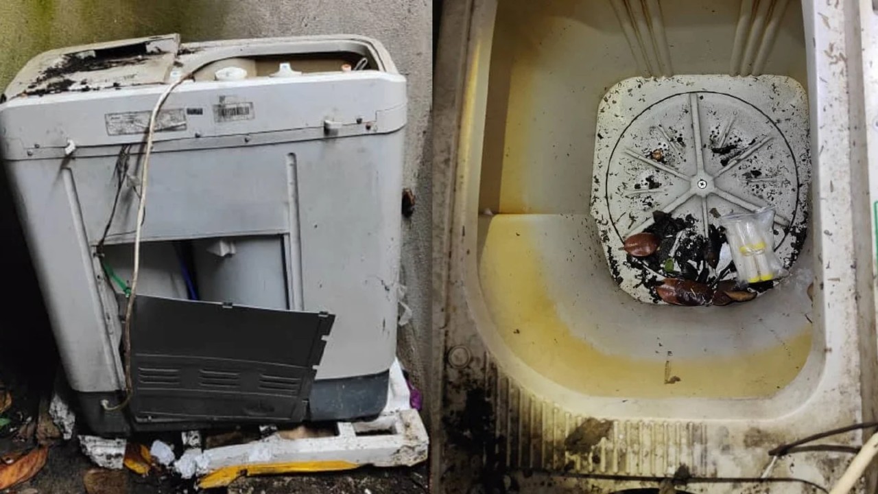 The PGA7 found RM1,460 in cash, heroin and syabu in the washing machine. Photo: PGA7